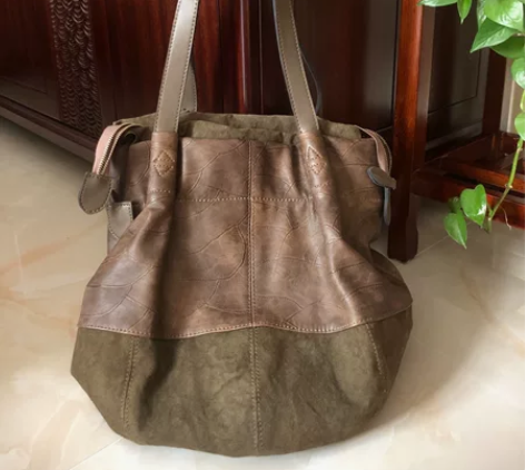 女士单肩水桶包，时尚流行色， 军绿色带暗纹...