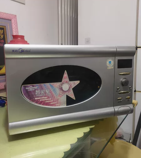 微波炉  用不到了   美的21L加厚不锈...