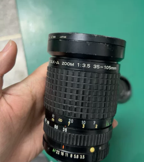 宾得A口变焦是手动镜头，35-105 F3...