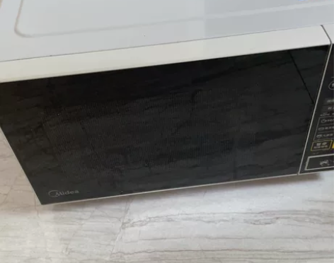 九成新美的微波炉 感兴趣的话点“我想要”和...