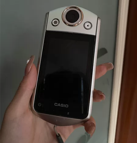 卡西欧tr350相机 就顶部磕掉了一块,其...