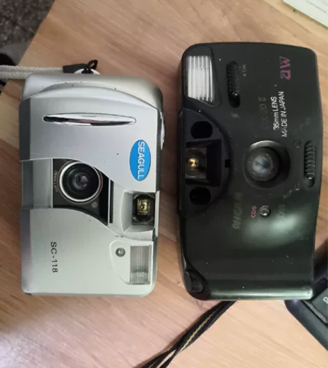 两个旧相机，一个海鸥的，一个日本牌子，日本...