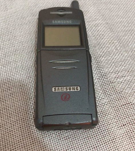 三星N100  成色如图，夹电能开机插卡有...