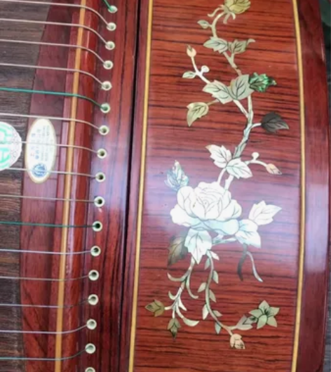 出敦煌 韵古筝，贝雕，基本全新，没有时间玩...