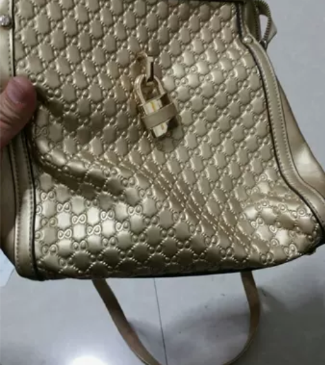 佳妮蒂诺女士挎包土豪金小牛皮手提包8成新无...