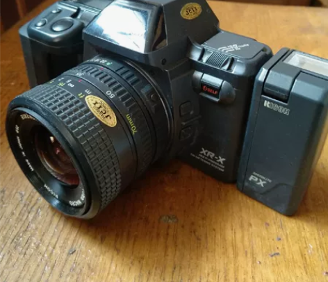 理光单反变焦胶片机 95新，镜头1：3.4...