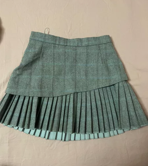 美美的夏夏家 毛呢百褶裙 感兴趣的话点“我...