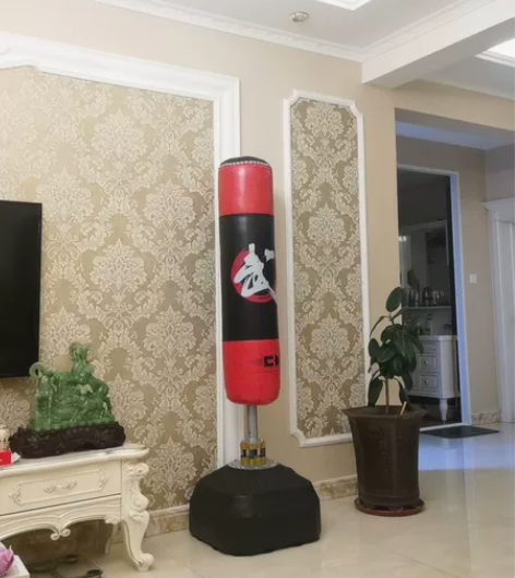 拳击沙袋 几乎全新 带拳击手套一对 买回来...