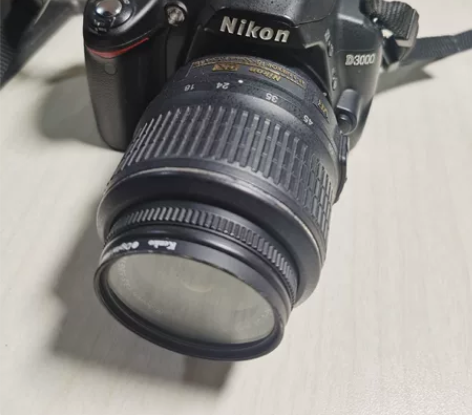 尼康D3000单反，机身加 18-55镜头...
