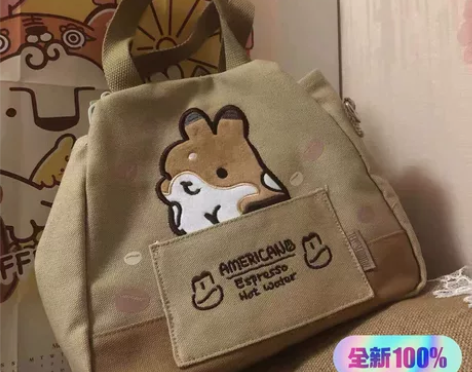 提摩西小队帆布包女斜挎包大学生手提包包卡通...
