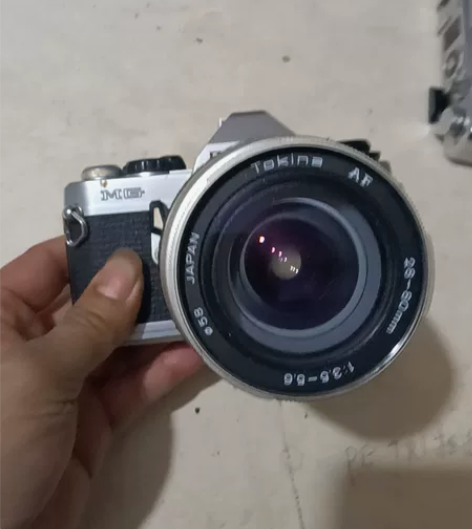 宾得MG相机一台。快门能按反应极慢，不知好...