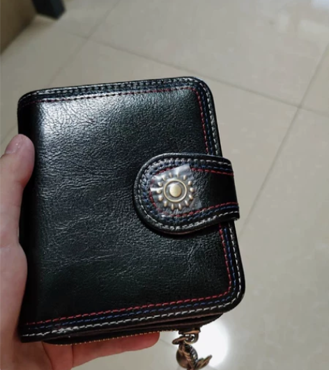 纳兰杜二层皮女士短钱包 感兴趣的话点“我想...