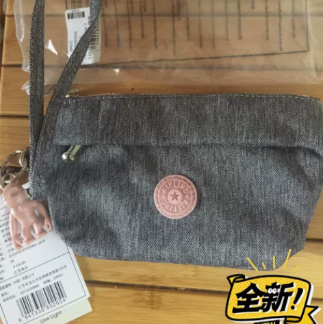 kipling吉普林 全新手拿包 天猫在售...