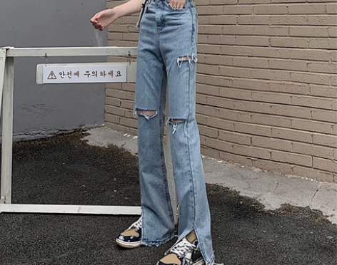 微喇开叉牛仔裤女春装2023年新款高腰显瘦...