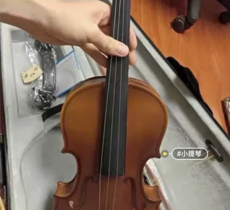 朋友送的1500买的4/4实木纯手工小提琴...