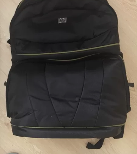 hp双肩背包，可以放笔记本电脑和单反相机搬...