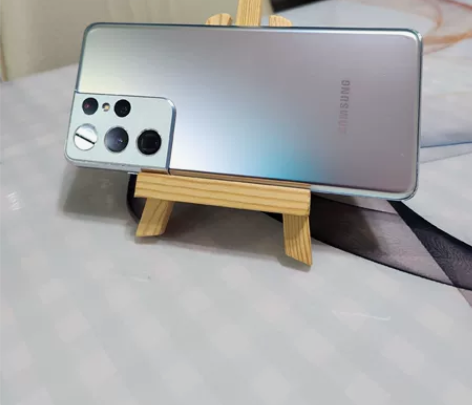 出99新国行三星s21u，银色12+256...