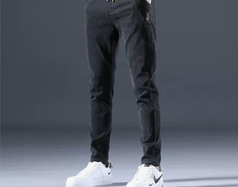 香港牛仔裤男加绒加厚修身小脚2022新款黑...