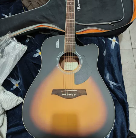 卢森单板民谣吉他，适合初学者，过年回家不方...