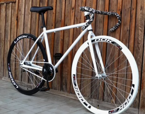 公路车 26寸 死飞赛车白蓝色 实心胎倒刹...