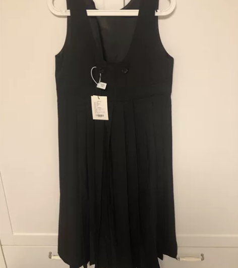 书白气质背带裙 全新正品带吊牌,M码。包邮...