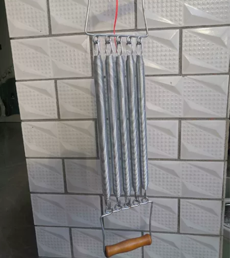 健牌拉力器，老库存没使用过。五根弹簧，内置...