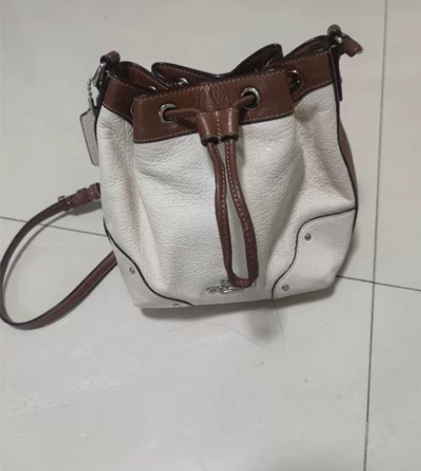 coach蔻驰女包小号全牛皮抽绳水桶包斜挎...