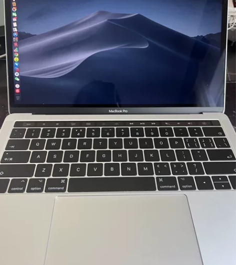 苹果笔记本MacBook Pro，银色，8...