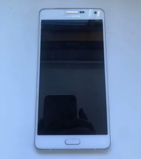 破旧手机单机。能充电。三星SM A7000...