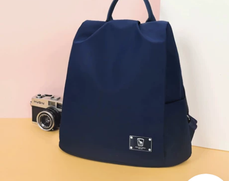 爱华仕 时尚女士休闲旅行背包防水学生帆布女...