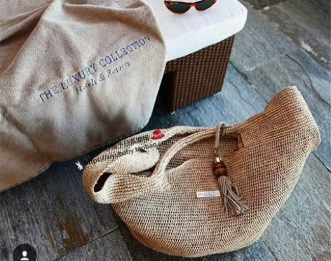 大气细密拉菲草手钩个性简约纯色草编手提包沙...