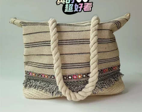 外贸尾货女士纯手工编织沙滩包手提包斜跨水桶...