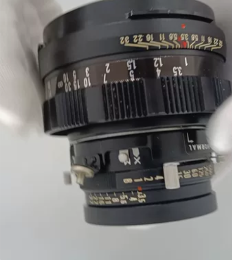 玛米亚新闻机,100/3.5镜头,后期黑头...