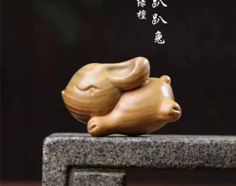 精品阿根廷绿檀木雕奔跑兔创意实木雕刻手把件...
