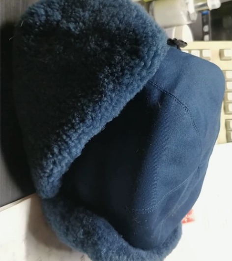 雷锋帽内置羊皮保真皮帽号码58成色如图，