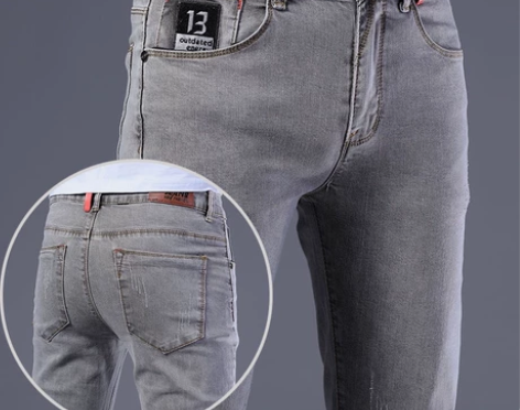 春夏季新款灰色牛仔裤男弹力修身潮牌小脚裤子...