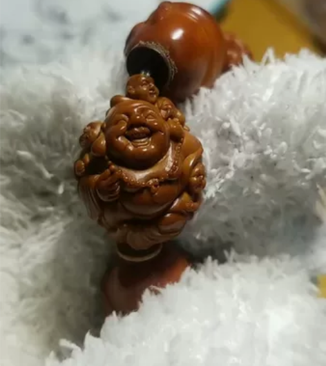 橄榄核单籽多宝手串，分别是皙俨老师浮雕童子...
