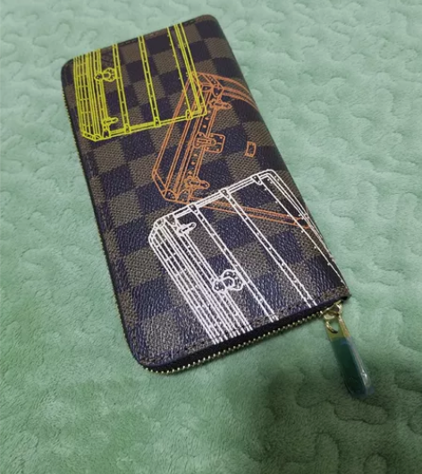 闲置长款钱包 男士女士都可以用。一次没用...