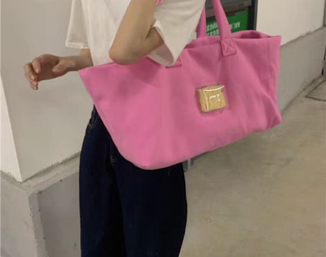 转卖手提包包女2021新款网红同款泡面包呢...