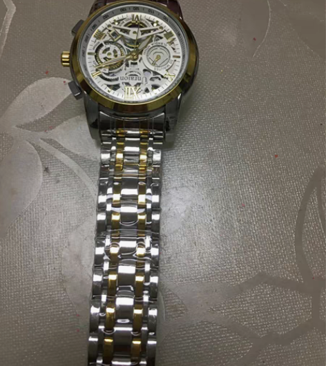 包邮去旅游时表店柜台买的男士全自动机械手表...