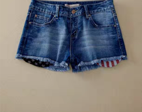 转卖夏装新款欧美风水洗磨白 口袋里衬印花美...