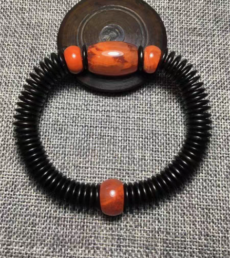 天然原矿川料南红+黑椰片“红与黑”手串25...