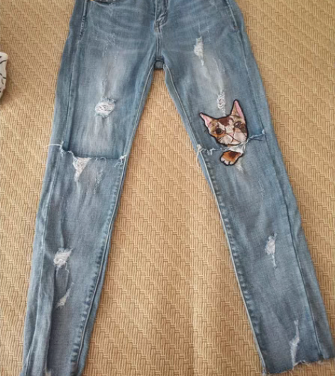 包邮九九新26码（相当于28码)猫咪破洞牛...