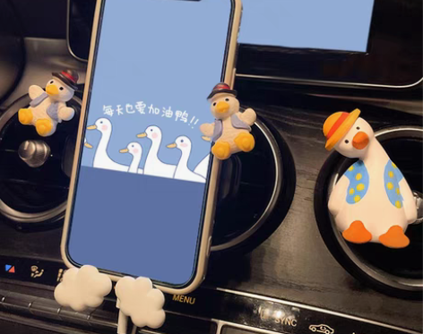 转卖车载手机支架网红卡通可爱出风口卡扣式导...