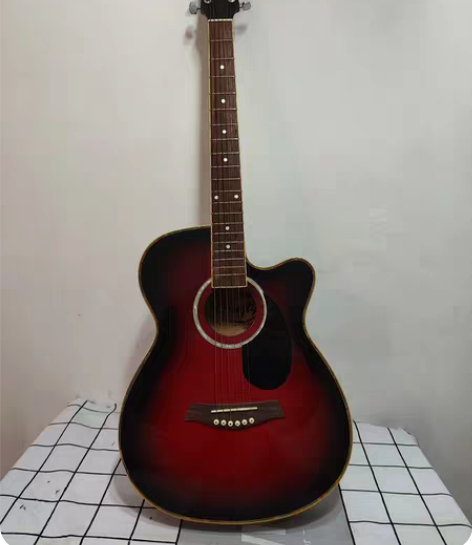 苏州相城区香城花园二区搬新家出一把吉他自提...