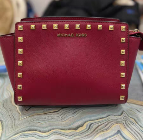 美国正品MK女包时尚笑脸包小号柳钉单肩斜挎...