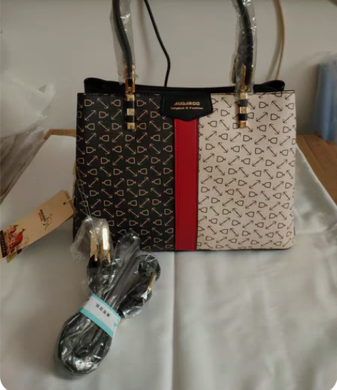 包邮全新澳蒂袋鼠黑色女士手提包 前面撞色设...