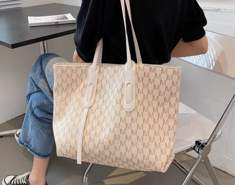 转卖大容量包包女包2021新款潮小众爆款高...