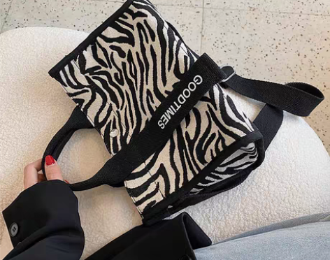 转卖大容量包包女小众斑马纹帆布包2021新...