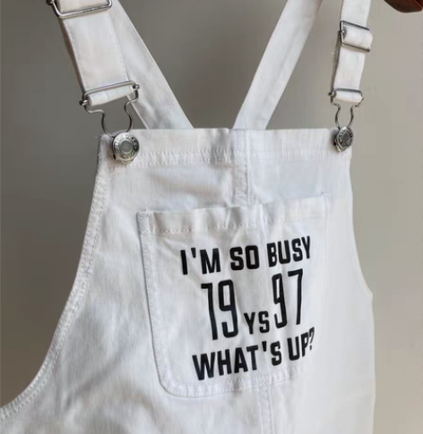 白色背带裙        品牌以纯 五金很...